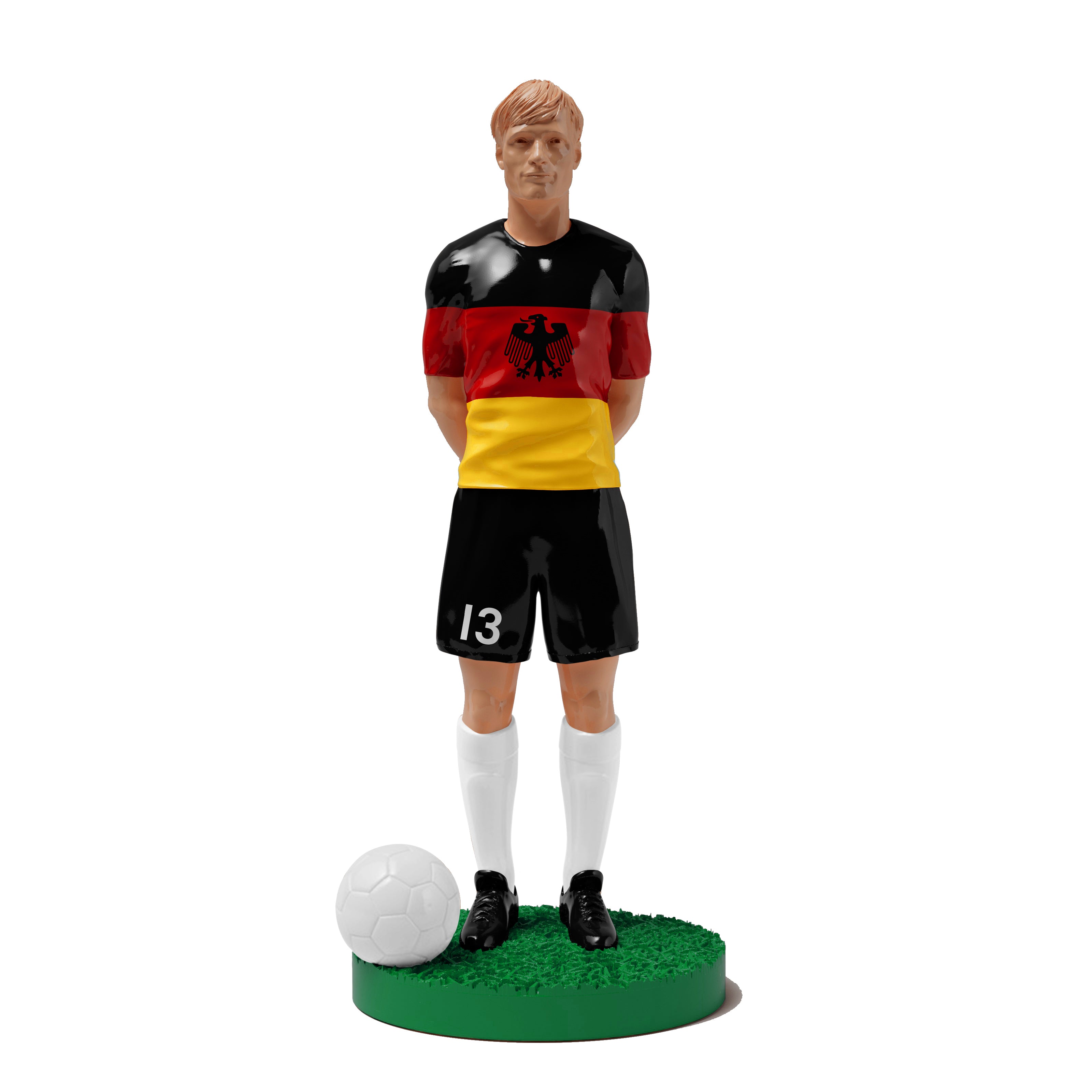 Figurine de collection Match Day FC équipe d'Allemagne, maillot noir rouge or à l'aigle, vue de face.
