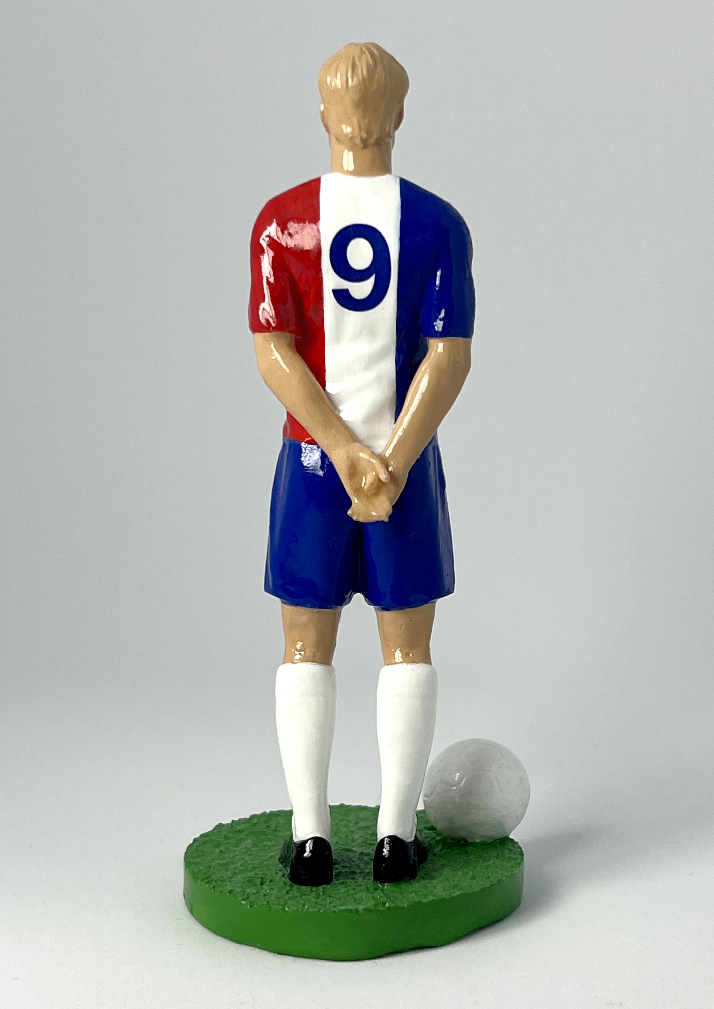 Figurine de collection Match Day FC équipe de France (n°9), maillot bleu blanc rouge au coq doré, vue de dos.